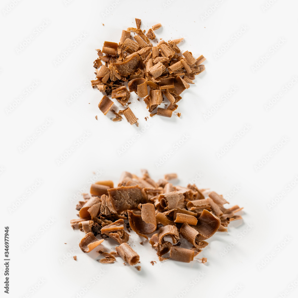 group of chocolate shavings isolated on white background group of chocolate shavings isolated on white background