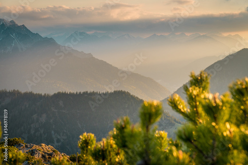 Fototapeta Naklejka Na Ścianę i Meble -  Mountain panorama of the Alps at sunset
