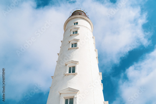 Lighthouse on a background of blue sky