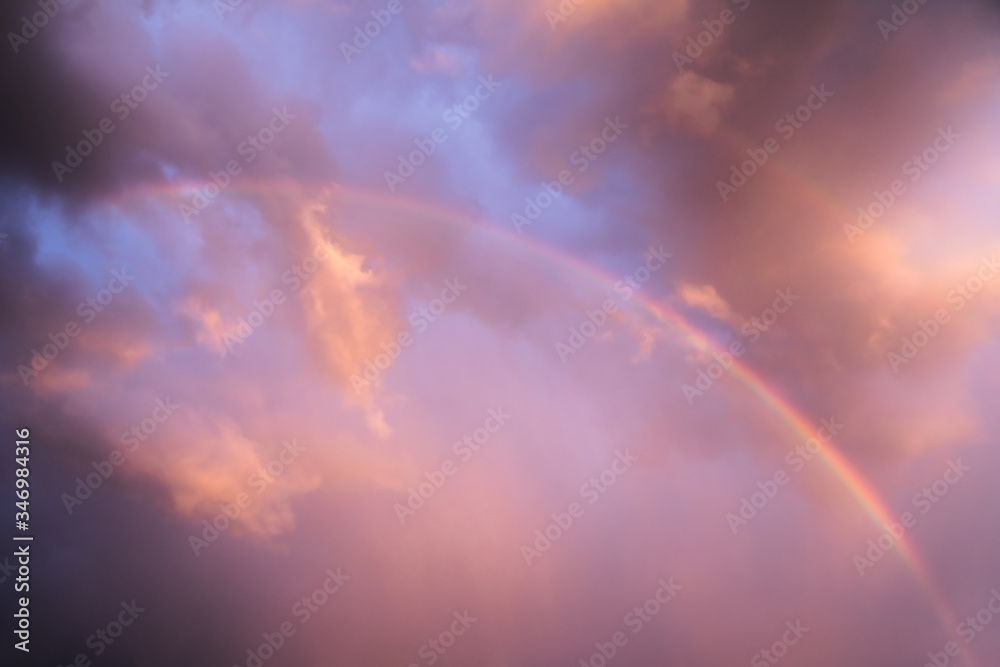 Rainbow At Dramatic Sunset