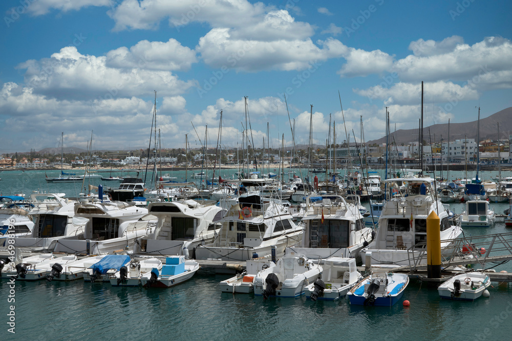 View of boats moored in the port of Corralejo, Fuerteventura, Spain