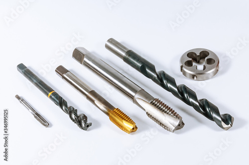 Tap for threading in metal. Tool for metal processing.