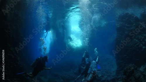 Wallpaper Mural cave diving underwater scuba divers exploring caves ocean scenery Torontodigital.ca