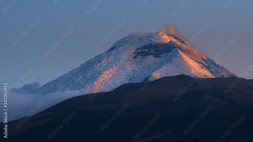 Sunset of the cotopaxi volcano from the city of Quito to latacunga in Ecuador