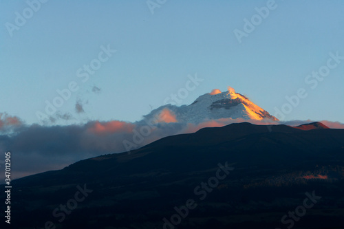 Sunset of the cotopaxi volcano from the city of Quito to latacunga in Ecuador