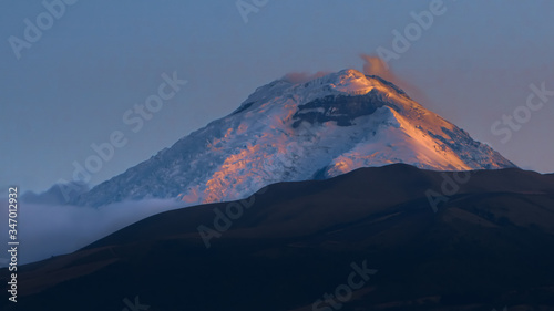 Sunset of the cotopaxi volcano from the city of Quito to latacunga in Ecuador