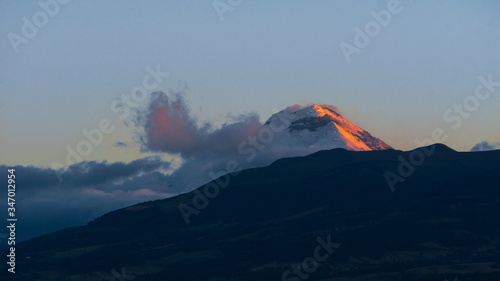 Sunset of the cotopaxi volcano from the city of Quito to latacunga in Ecuador photo