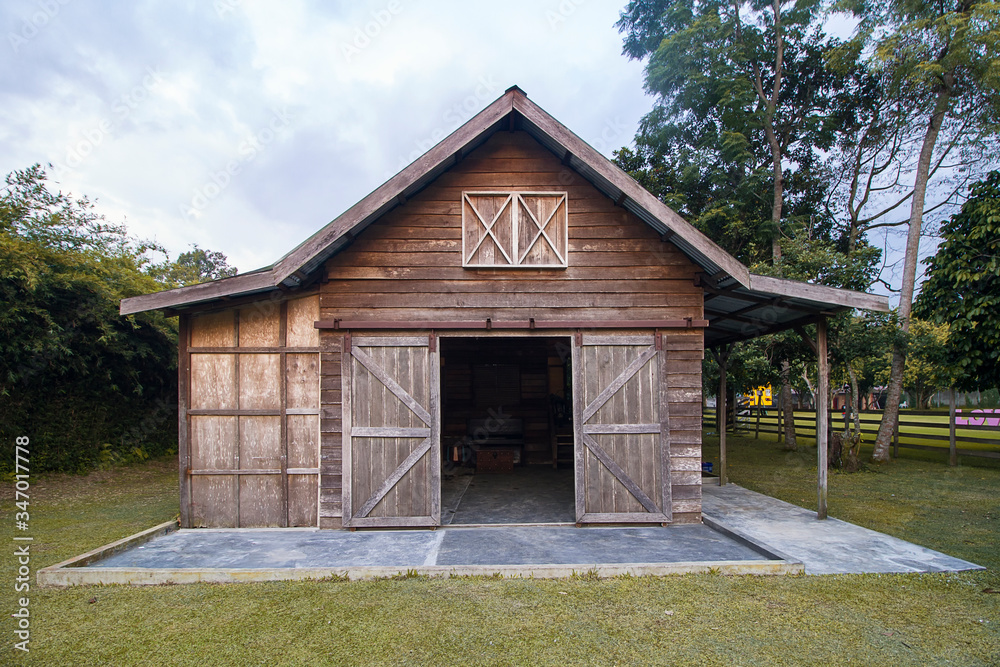 old wooden house in the woods. open door old wooden house in the woods. open door