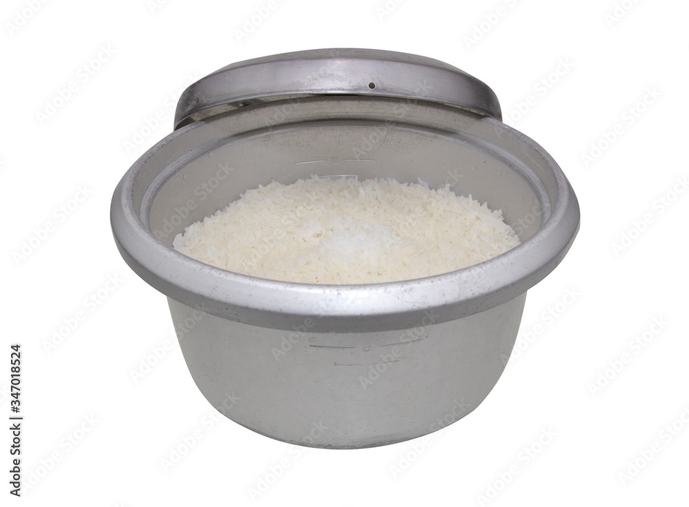 Rice steamed in the cooker isolated on white background Rice steamed in the cooker isolated on white background