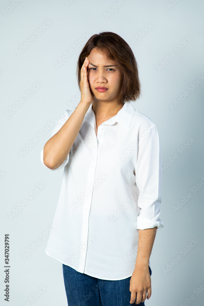 Asian women suffer from severe toothache. Teeth decay, teeth sensitivity and dental clinic Asian women suffer from severe toothache. Teeth decay, teeth sensitivity and dental clinic