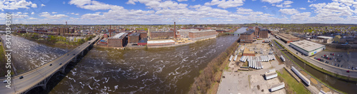 Historic mills aerial view panorama including Pacific, Washington, Pemberton and Ayer Mills by the Merrimack River in downtown Lawrence, Massachusetts MA, USA.  photo