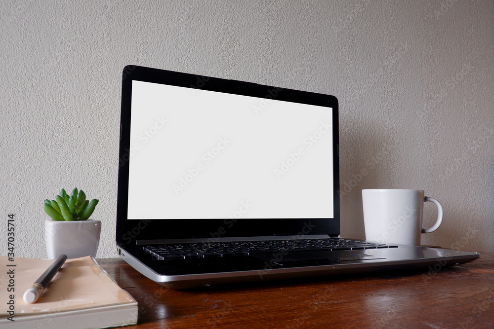 Cropped shot view of white office desk table with the office equipments, alcohol sanitizer, face mask and other office supplies on the modern space, flat lay.work at home. Cropped shot view of white office desk table with the office equipments, alcohol sanitizer, face mask and other office supplies on the modern space, flat lay.work at home.