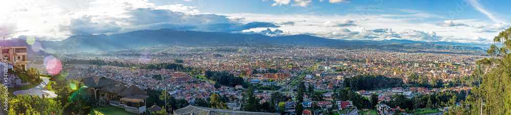 Panoramic view of the city of Cuenca, Ecuador, close to sunset, from an observation point. 