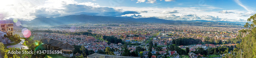 Panoramic view of the city of Cuenca, Ecuador, close to sunset, from an observation point.  © alanfalcony