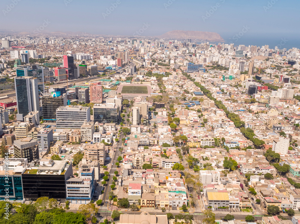 Panoramic aerial drone view of the buildings of Lima city at lockdown on coronavirus pandemic in 2020, in Peru.