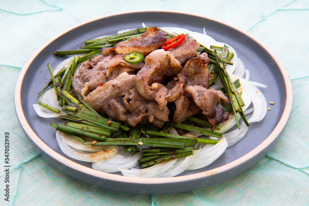 Fototapeta premium Fried Beef Brisket with garlic chives salad