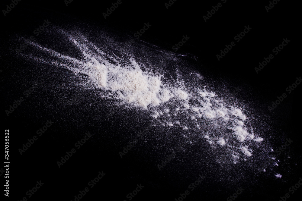 

Photos
White powder explosion on black background.Stopping the movement of white powder on dark background. Launched white powder splash