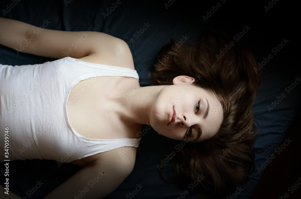 Portrait of a beautiful young woman with blue eyes. Portrait of a beautiful young woman with blue eyes.