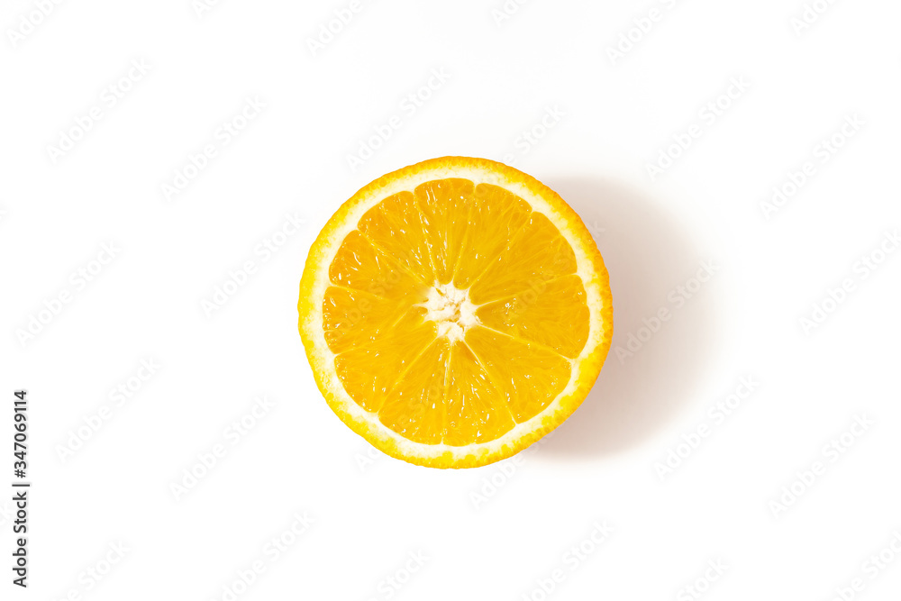 Half cut orange on a white background top view Half cut orange on a white background top view
