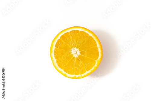 Half cut orange on a white background top view