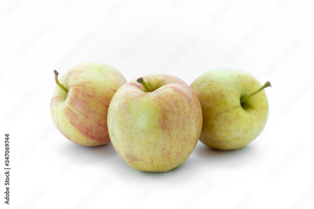 three isolated apples on a white background three isolated apples on a white background