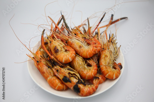 Hot Grill Shrimps. Fresh Grilled Shrimps with White Background. © pisanu107