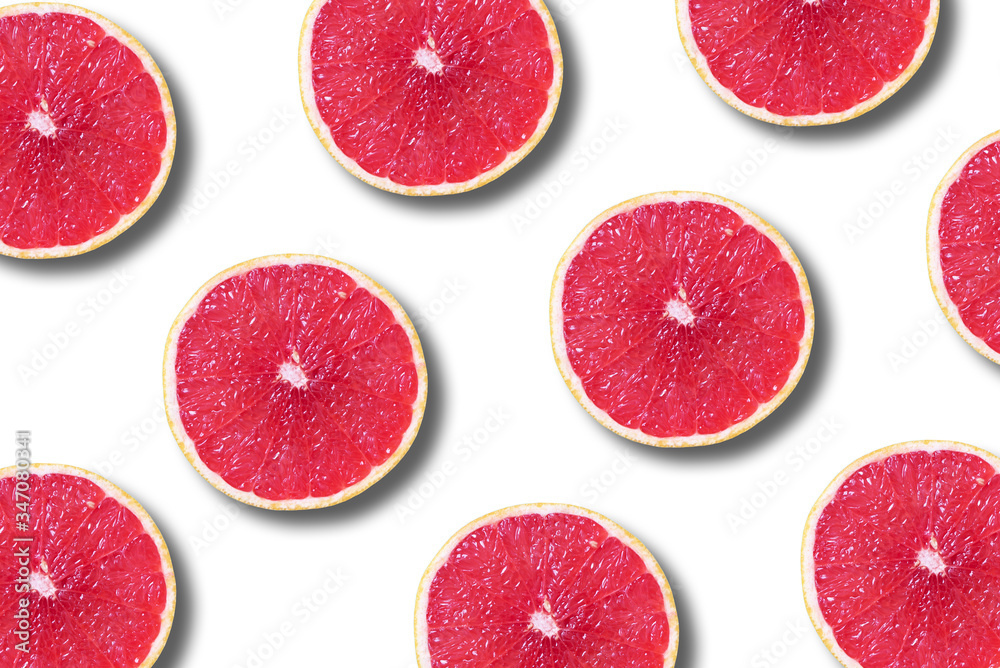 Grapefruit pattern on white background. Top view. Creative design, minimal flat lay concept. Summer time. Tropical travel, exotic fruit. Vegan and vegetarian food Grapefruit pattern on white background. Top view. Creative design, minimal flat lay concept. Summer time. Tropical travel, exotic fruit. Vegan and vegetarian food