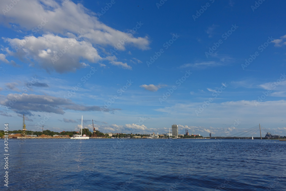 View across the river Daugava to the cable-stayed bridge and the city on the opposite bank, Riga, Latvia