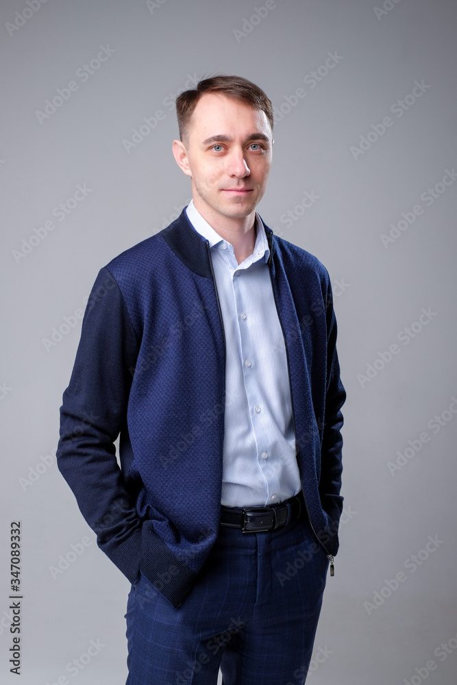 man in a business suit on a plain background man in a business suit on a plain background