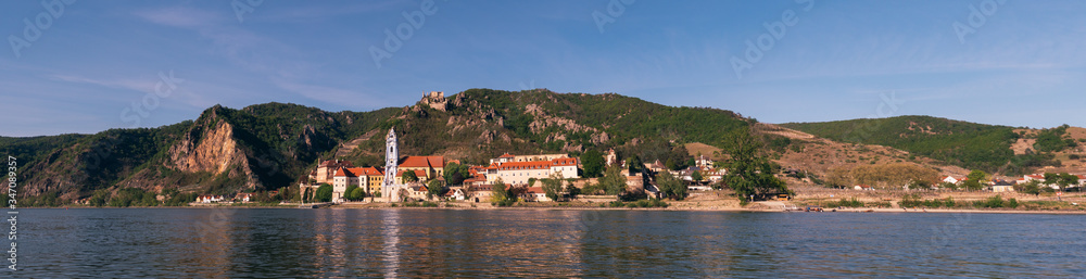 Duernstein Cityscape Panorama in the Wachau Valley, with River Danube, Baroque Blue and White Tower of the Abbey Church and Kuenringer Castle on a Spring Evening