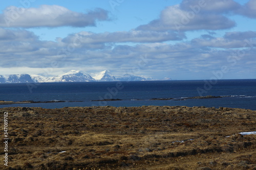 the ocean Bay in the beautiful snowy mountains. The Landscape Of Iceland