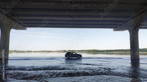 car on the river