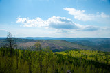Mountain landscape.Magnificent panoramic view of the forest and beautiful blue sky. The beauty of wild virgin nature. peace