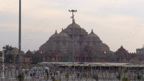 Exterior of Akshardham Temple and Tourists in Delhi, India photo