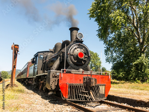 Tourist train called Valdiviano that runs from Valdivia to Antilhue with a 1913 North British locomotive type 57. Los Rios Region, in southern Chile.