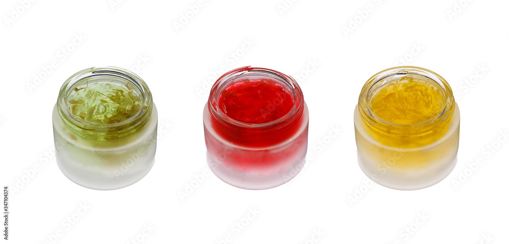 Collection of gel creams and containers for skincare with flower ingredients Collection of gel creams and containers for skincare with flower ingredients