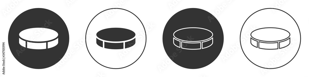 Black Hockey puck icon isolated on white background. Sport equipment. Circle button. Vector Illustration Black Hockey puck icon isolated on white background. Sport equipment. Circle button. Vector Illustration