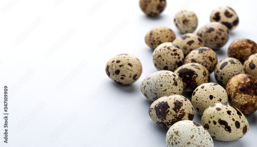 Fresh quail eggs isolated on white background with copy space Fresh quail eggs isolated on white background with copy space