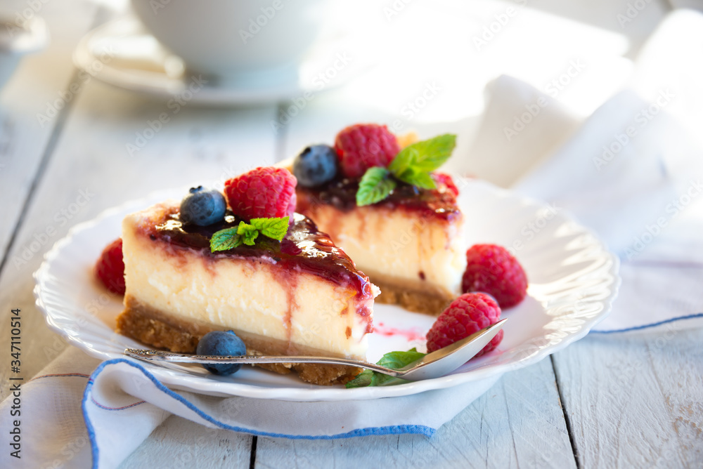 Homemade delicious cheesecake with fresh fruit and mint Homemade delicious cheesecake with fresh fruit and mint