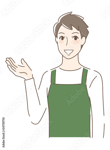 笑顔で手のひらを差し出す男性