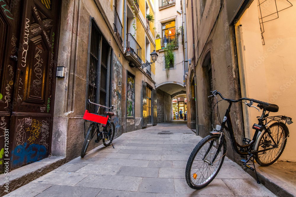 Bikes for rent in a Gothic quarter, Barcelona, Spain. 