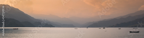 Landscape of Phewatal lake in Pokhara, Nepal, at sunset.