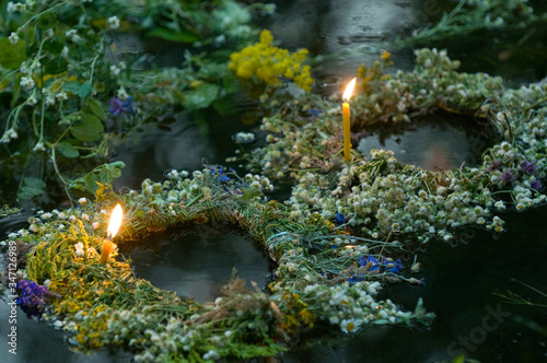 Wreathes witn candles on water photo