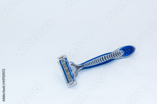 blue razor on white background 