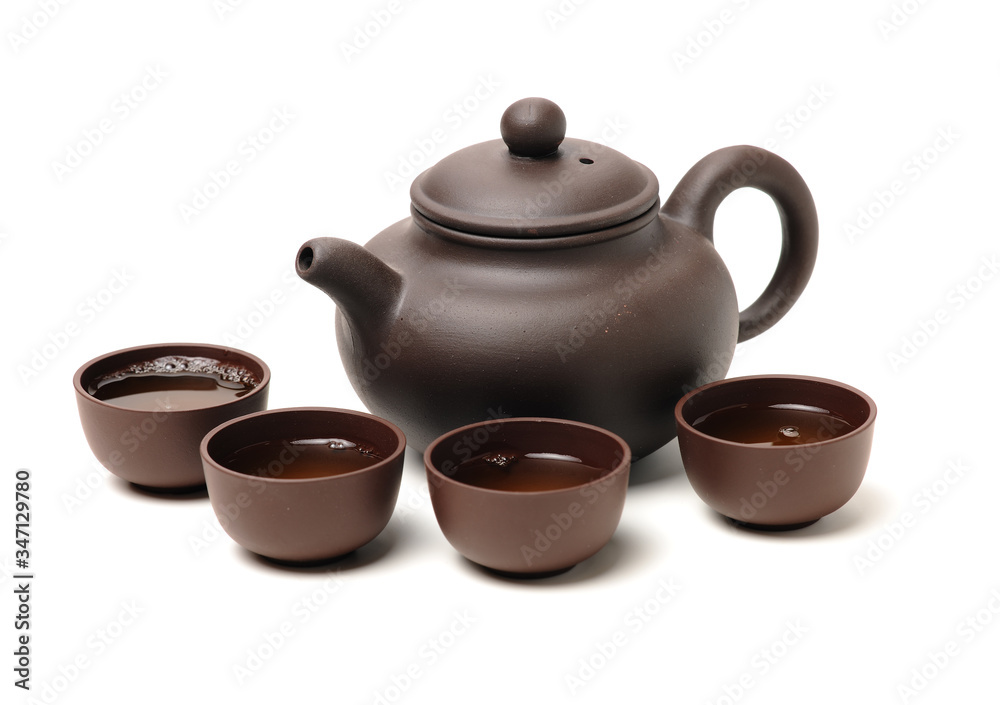 Closeup of tea set on white background