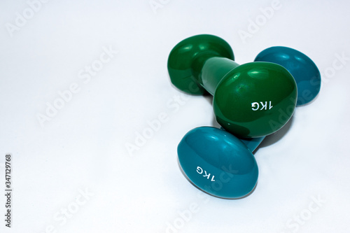 Dumbbell close up isolated on white background