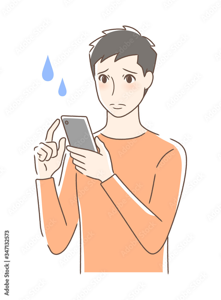 スマホを操作して不安な男性 スマホを操作して不安な男性
