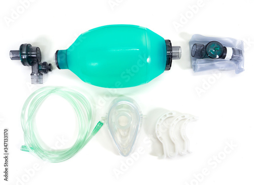 Medical breathing devices called Ambu are placed on a white background with 6 parts placed next to each other. Concept Life-saving devices