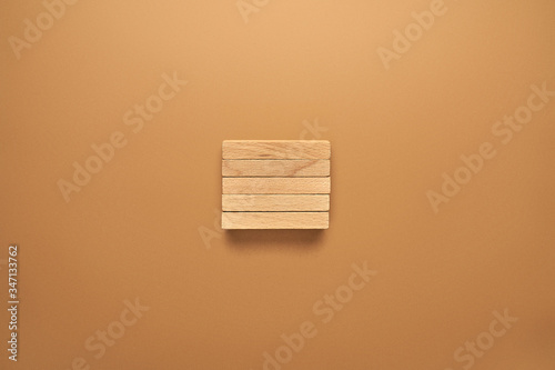 Fototapeta Naklejka Na Ścianę i Meble -  Drewniane klocki ułożone w konceptualnym wizerunku