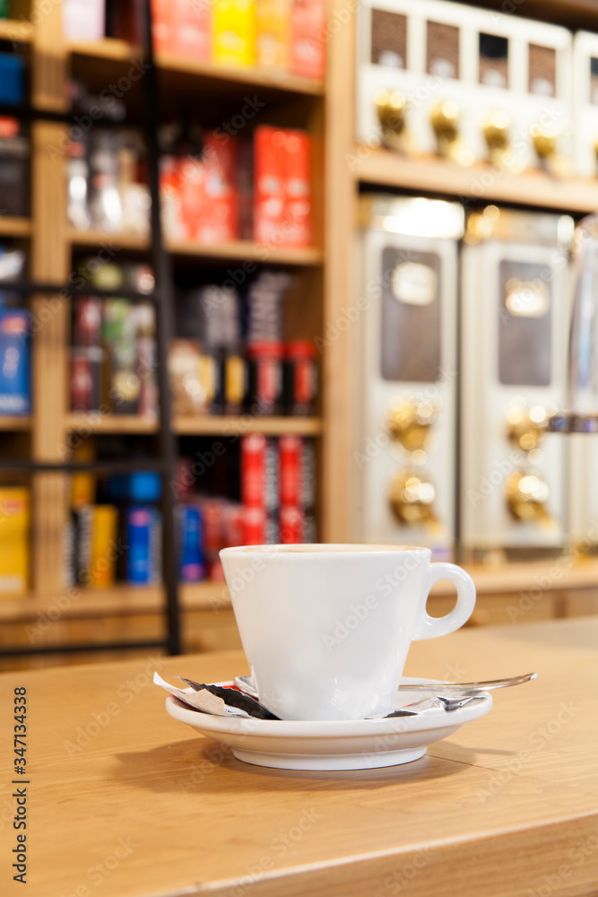Coffee close up in a wooden table. Coffee shop background with copy space Coffee close up in a wooden table. Coffee shop background with copy space